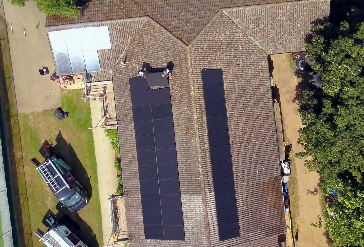 A drone captures the installation of solar panels on the Copdock Cricket Club pavilion